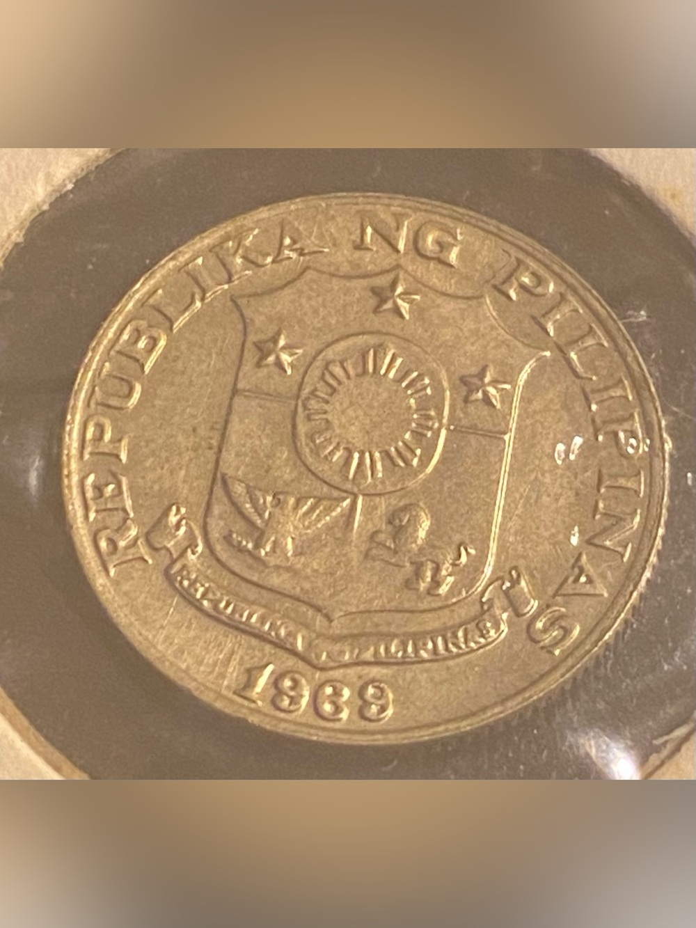 1969 Philippines 5 Sentimos coin featuring the coat of arms of the Philippines o